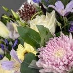 Pink and white flowers in a floral bouquet