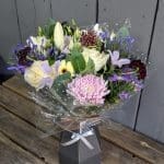 A bouquet of pink and lilac coloured flowers from the top